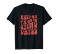 Hold Im Overstimulated Funny Groovy T-Shirt - Novelty Apparel Unisex - T-Shirt, Sweatshirt, Hoodie