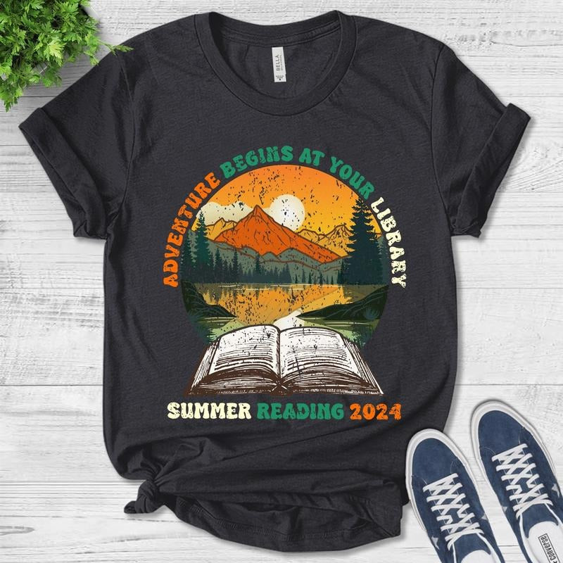 Adventure Begins Your Library Summer Reading 2024 Shirt Vintage Shirt Library Book Lover Librarian Bookworm T-Shirts, Hoodie, Sweatshirt - T-Shirt, Sweatshirt, Hoodie