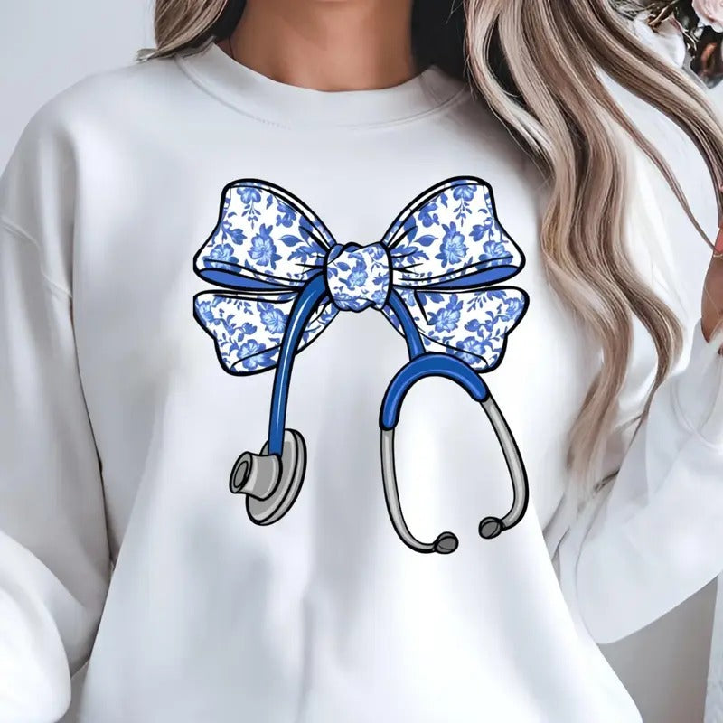 Blue Floral Stethoscope Bow Nurse Shirt Nursing Registered Nurse Shirt Nurse Week Shirt Graduation New Nurse ER RN Her T-Shirts, Hoodie, Sweatshirt - T-Shirt, Sweatshirt, Hoodie