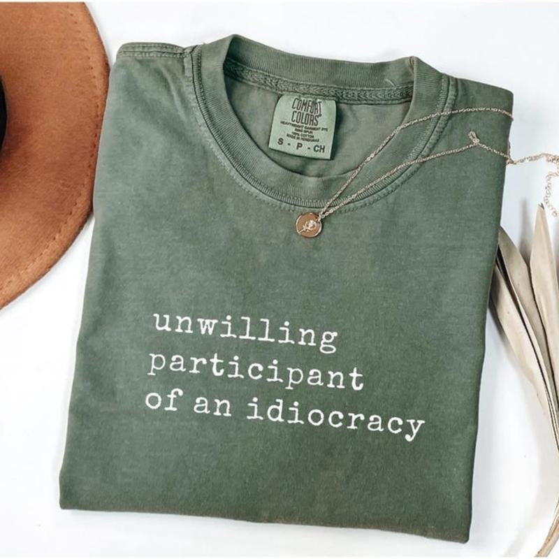 Comfort Color Unwilling Participant Idiocracy Kakistocracy Shirt Gender Neutral Shirt T-Shirts, Hoodie, Sweatshirt - T-Shirt, Sweatshirt, Hoodie