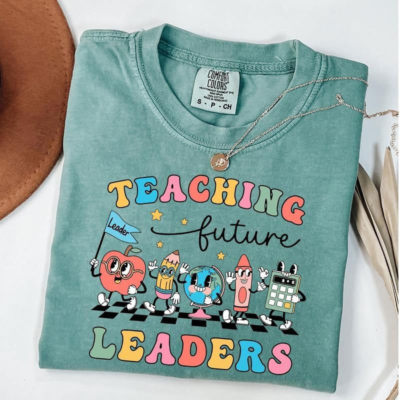 Comfort Colors Teaching Future Leaders Shirt Groovy Teacher Shirt Cute Teacher Shirt Kindergarten Teacher Back School T-Shirts, Hoodie, Sweatshirt - T-Shirt, Sweatshirt, Hoodie