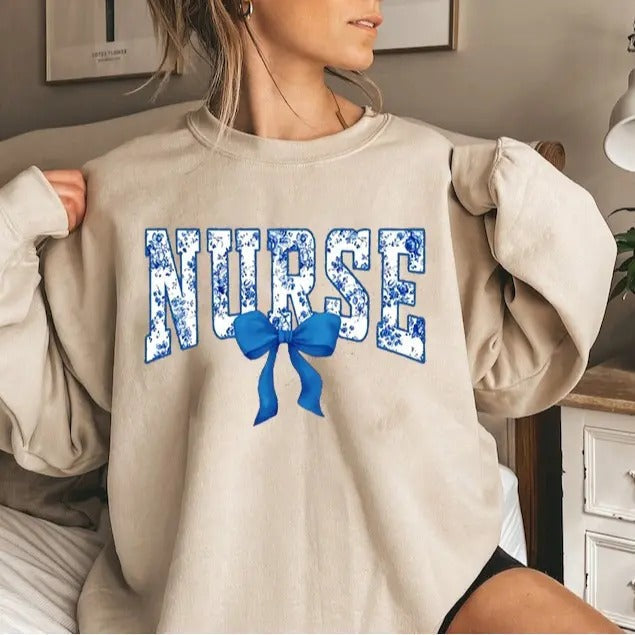 Coquette Bow Nurse Toile De Jouy Coquette Nurse Shirt Nurse Ribbon Coquette Nurse New Nurse Tops Womenswear T-Shirts, Hoodie, Sweatshirt - T-Shirt, Sweatshirt, Hoodie