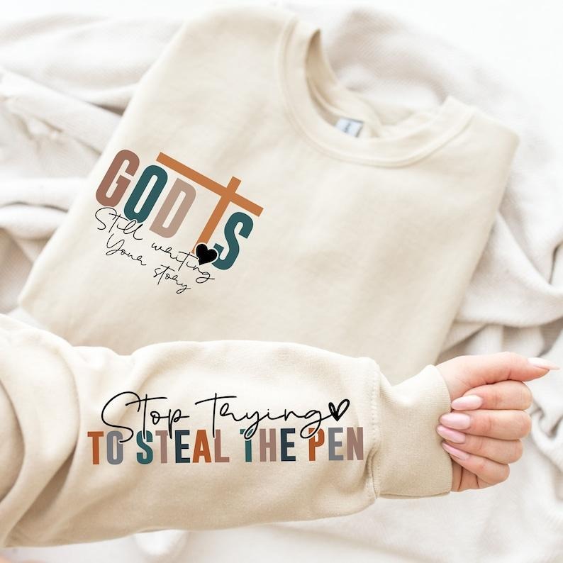 God Is Still Writing Your Story Inspirational Church Christian Bible Verse T-Shirts, Hoodie, Sweatshirt - T-Shirt, Sweatshirt, Hoodie