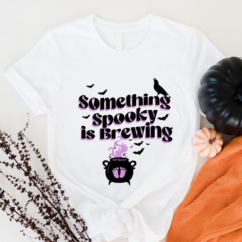 Maternity Halloween Something Spooky Is Brewing Shirt Halloween Pregnancy Announcement Shirt Baby Shower New Mom Be Short Sleeve T-Shirts, Hoodie, Sweatshirt - T-Shirt, Sweatshirt, Hoodie