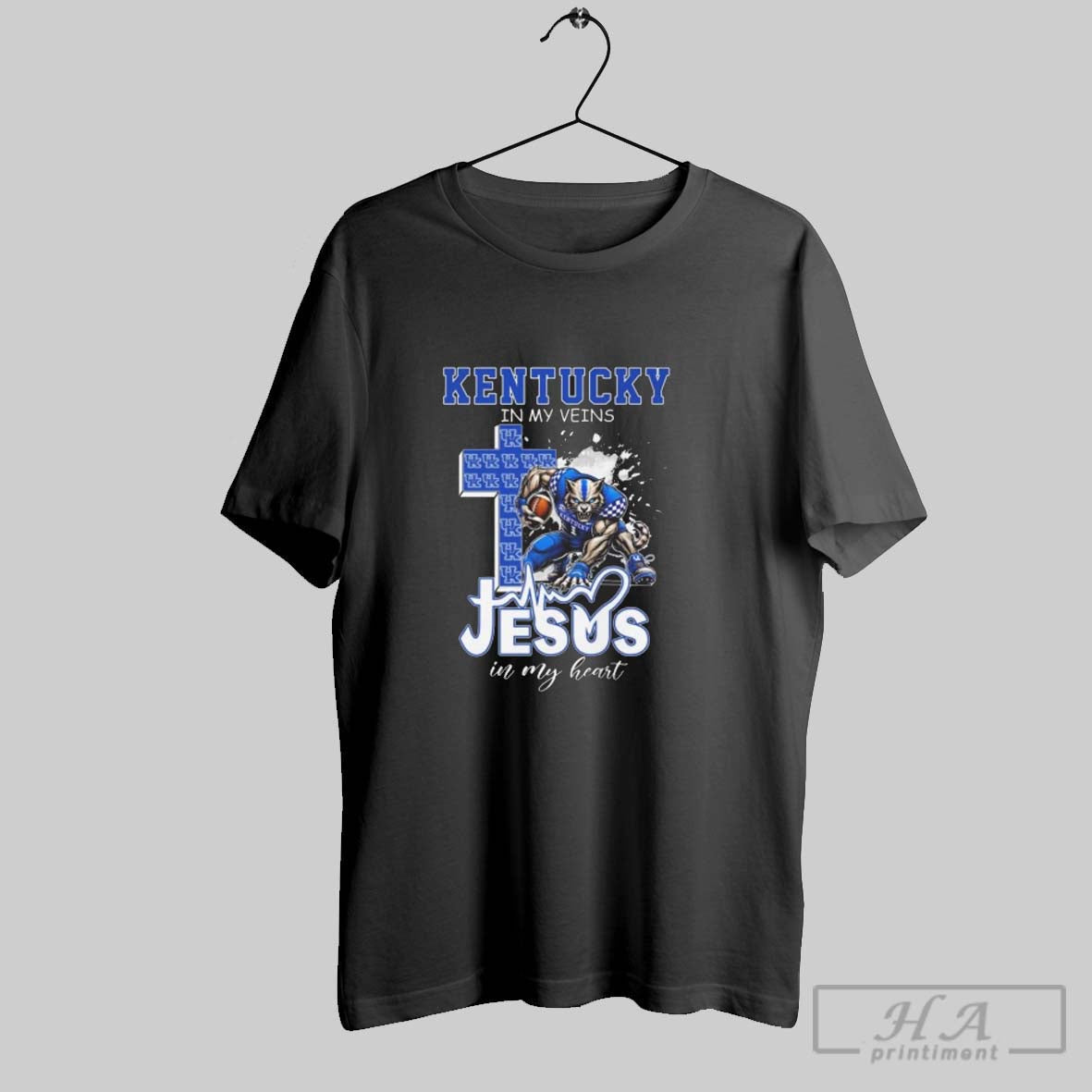 Official Kentucky Wildcats Mascot In My Veins Jesus In My Heart 2025 Unisex T-shirt, Sweatshirt, Hoodie, Long Sleeve Tee - T-Shirt, Sweatshirt, Hoodie
