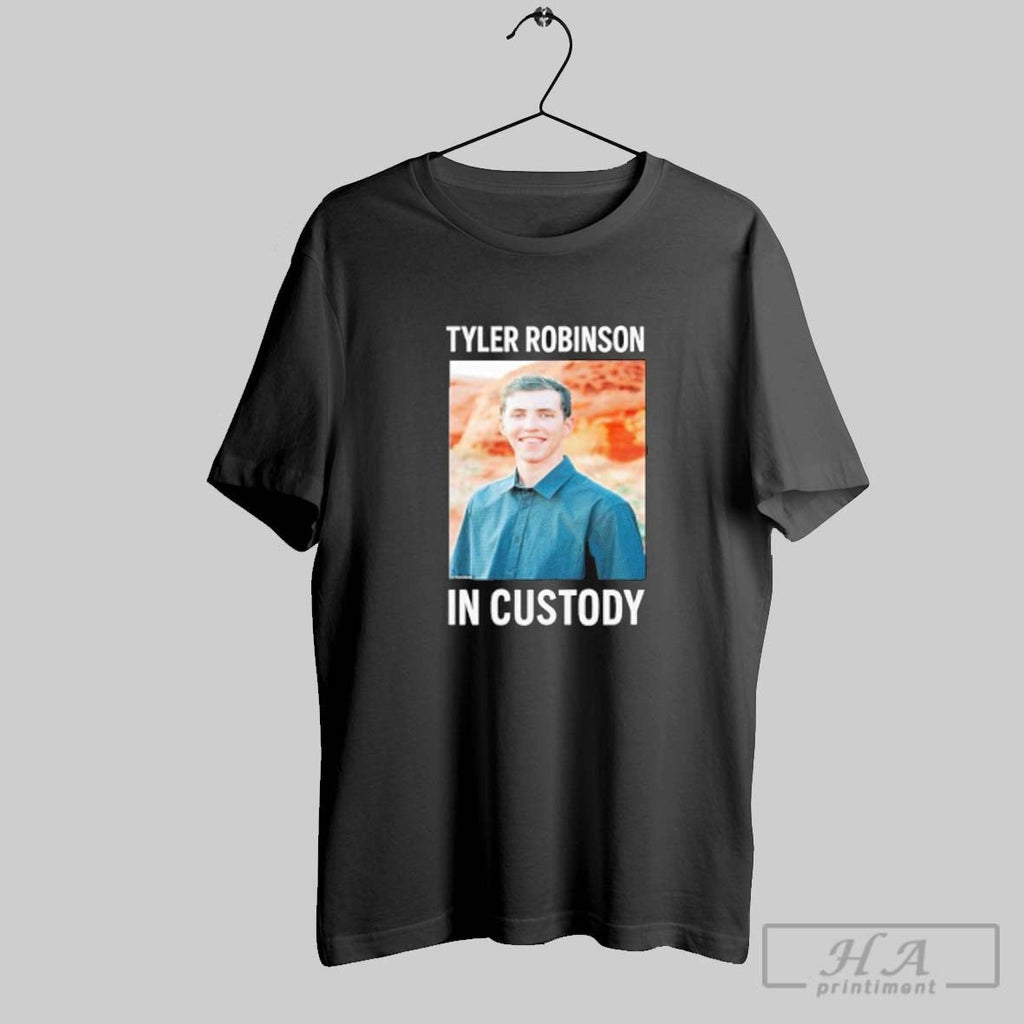 Official Tyler Robinson In Custody T Shirt Unisex T-shirt, Sweatshirt, Hoodie, Long Sleeve Tee - T-Shirt, Sweatshirt, Hoodie