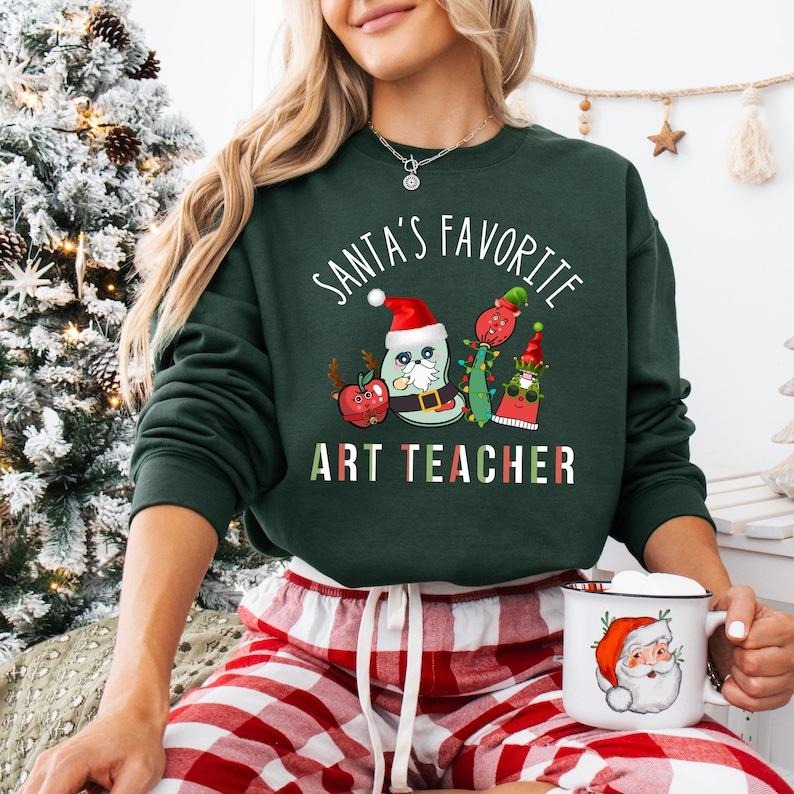 Santa'S Favorite Art Teacher Art Lover Xmas Art Teacher Shirt Very Merry Art Teacher T-Shirts, Hoodie, Sweatshirt - T-Shirt, Sweatshirt, Hoodie