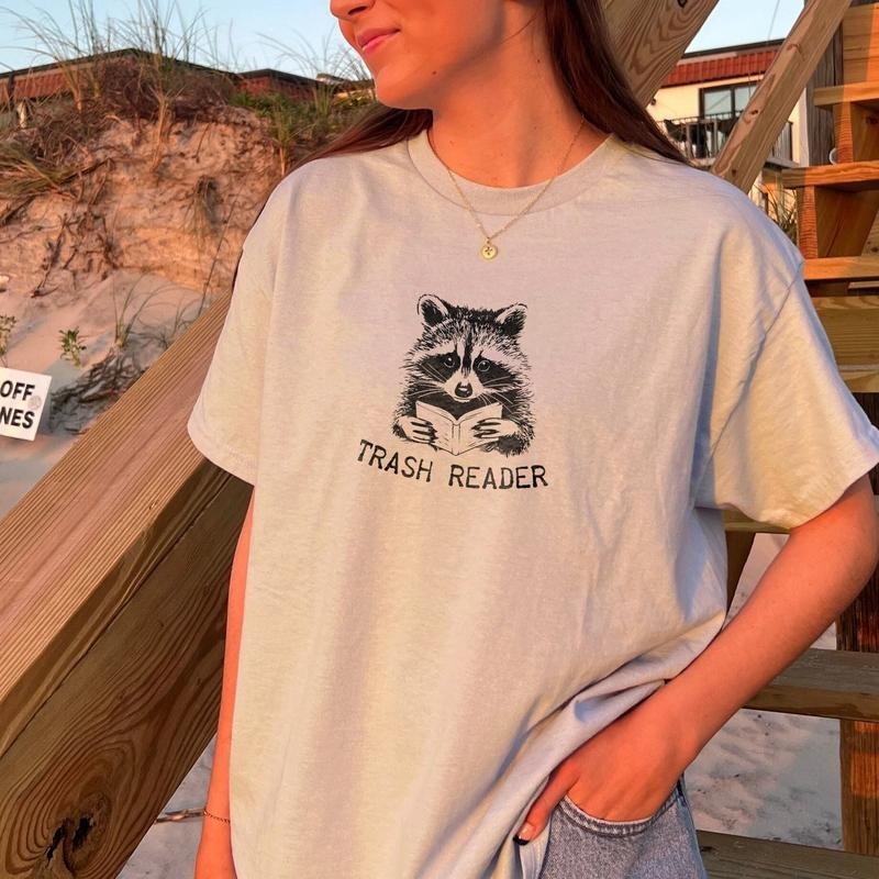 Smut Reader Bookish Raccoon Shirt Trash Reader Romance Goblincore Fan Book Lover Funny Bookish Smutty Books Fan Art T-Shirts, Hoodie, Sweatshirt - T-Shirt, Sweatshirt, Hoodie