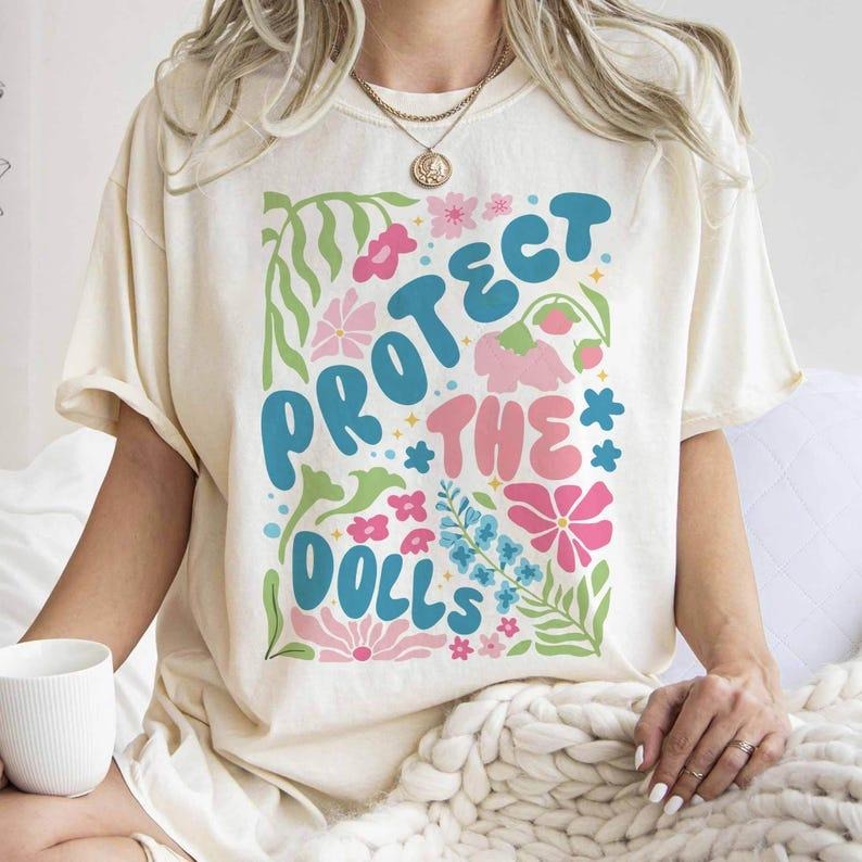 Sonia Samra Protect Dolls Trans Rights Protect Trans Folks Smooth Fabric Streetwear T-Shirts, Hoodie, Sweatshirt - T-Shirt, Sweatshirt, Hoodie