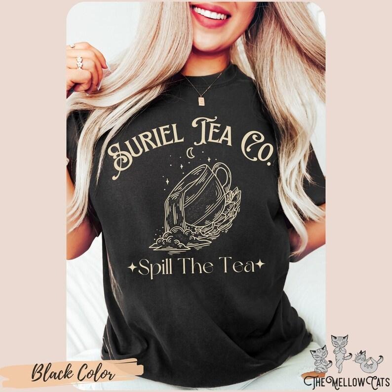 Suriel Tea Co Shirt Acotar OFFICIAL LICENSE Sarah J. Maas Sjm Court Thorns Roses Velaris T-Shirts, Hoodie, Sweatshirt - T-Shirt, Sweatshirt, Hoodie