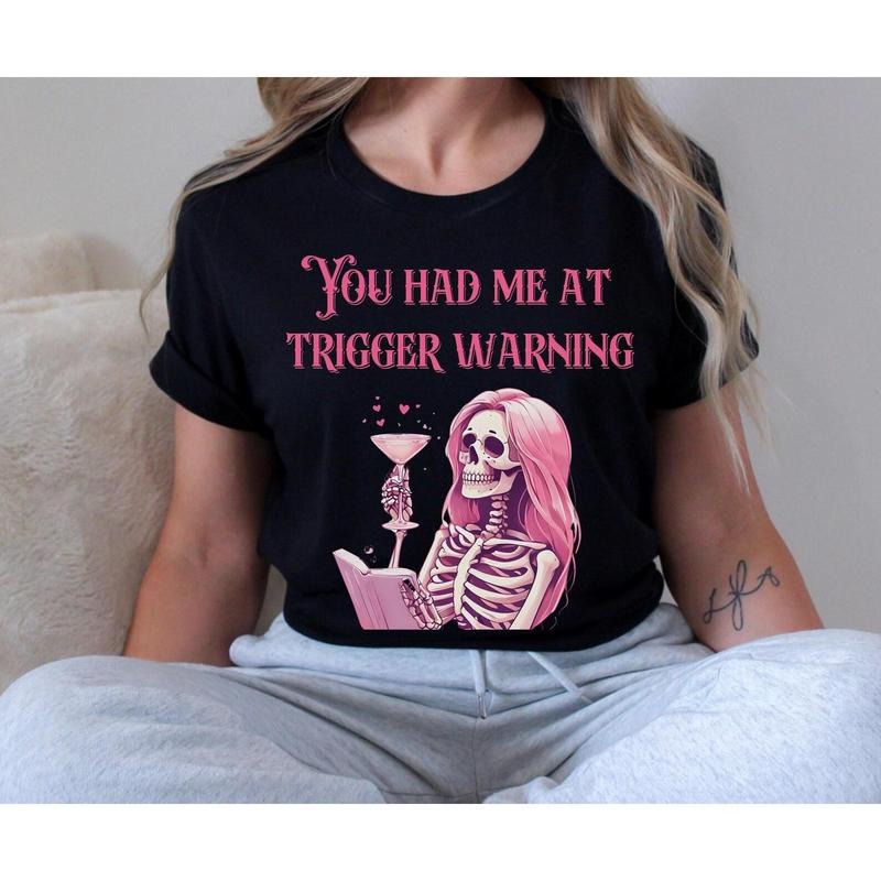 TRIGGER WARNING Sassy Skeleton Dark Romance Shirt Her Casual Unique Readers T-Shirts, Hoodie, Sweatshirt - T-Shirt, Sweatshirt, Hoodie