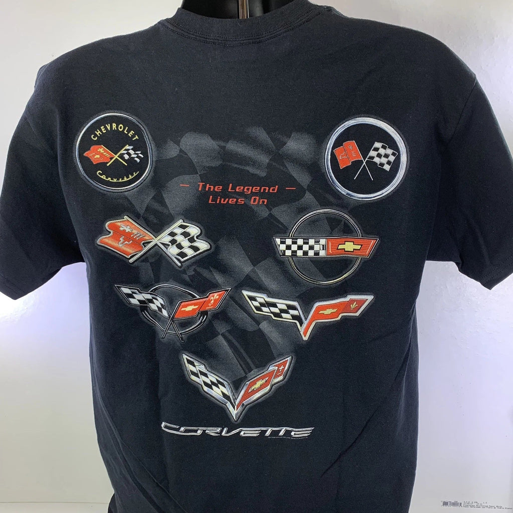 Corvette T-Shirt - The Legend Lives On W/ C-1 C-2 C-3 C-4 C-5 C-6 C-7 Emblems Unisex T-shirt, Sweatshirt, Hoodie, Long Sleeve Tee - T-Shirt, Sweatshirt, Hoodie