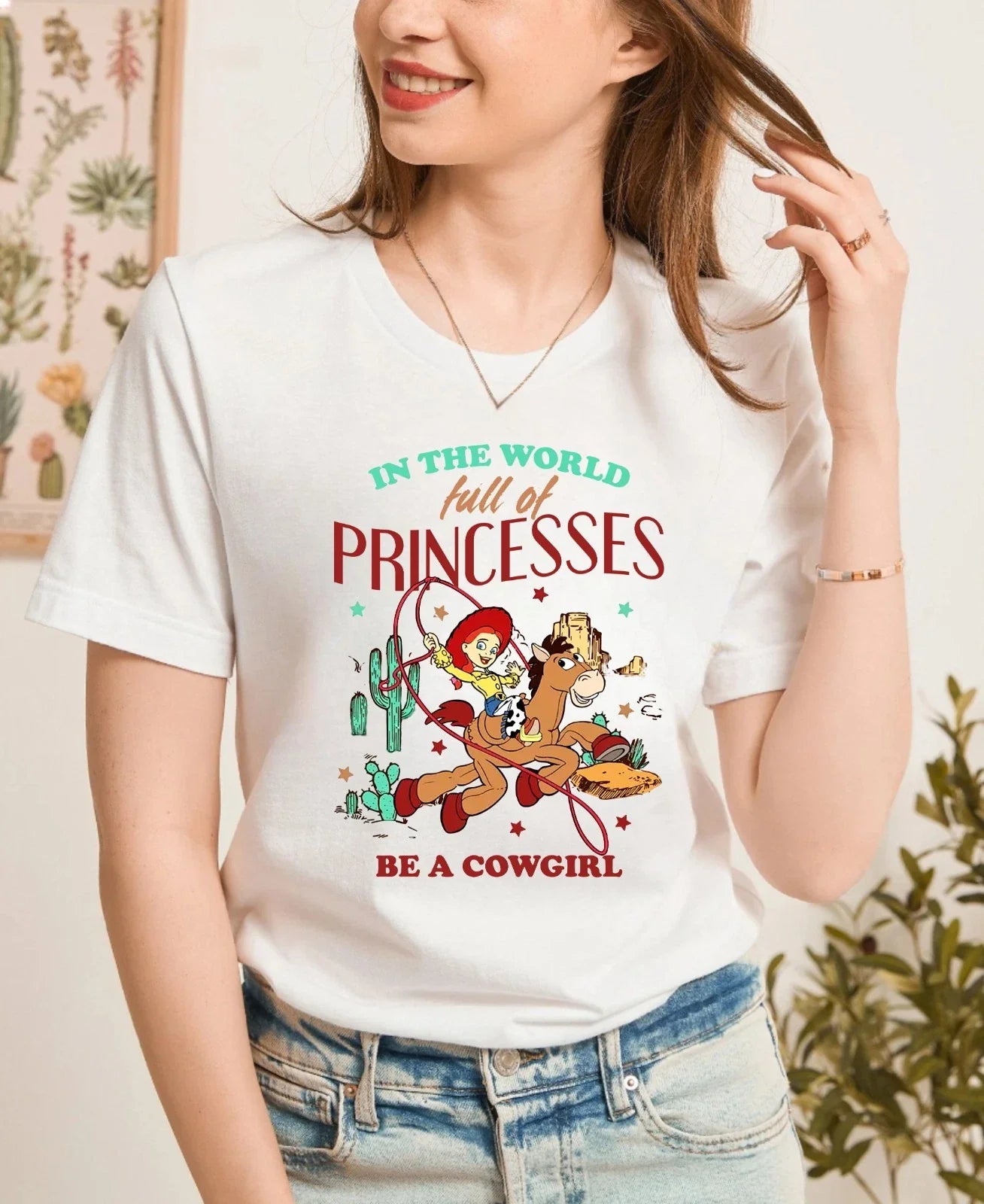 In a World Full of Princesses Be a Cowgirl Shirt, Western Cowgirl Tee, Cute tee Unisex T-shirt, Sweatshirt, Hoodie, Long Sleeve Tee - T-Shirt, Sweatshirt, Hoodie