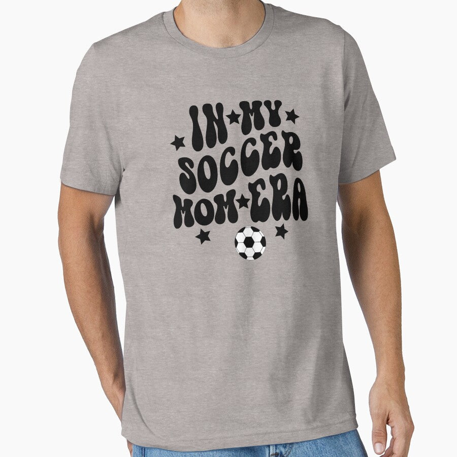 In My Soccer Mom Era, by DAM Creative, by DAM Creative  Unisex T-shirt, Sweatshirt, Hoodie, Long Sleeve Tee - T-Shirt, Sweatshirt, Hoodie