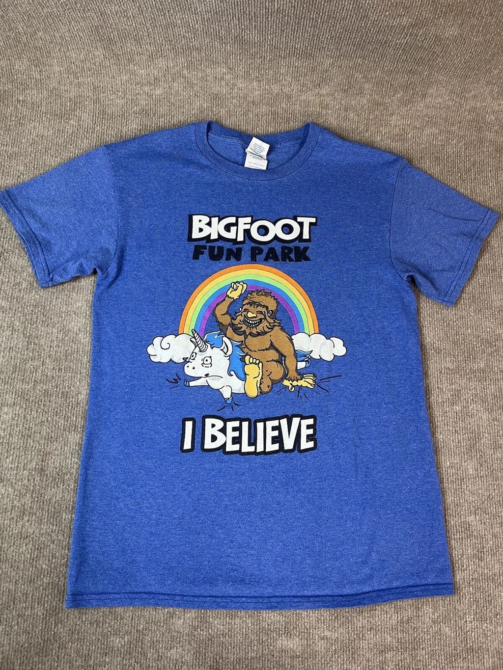Adult S T Shirt Bigfoot Fun Park Rainbow Unicorn Believe Fantasy Blue Travel Unisex T-shirt, Sweatshirt, Hoodie, Long Sleeve Tee - T-Shirt, Sweatshirt, Hoodie