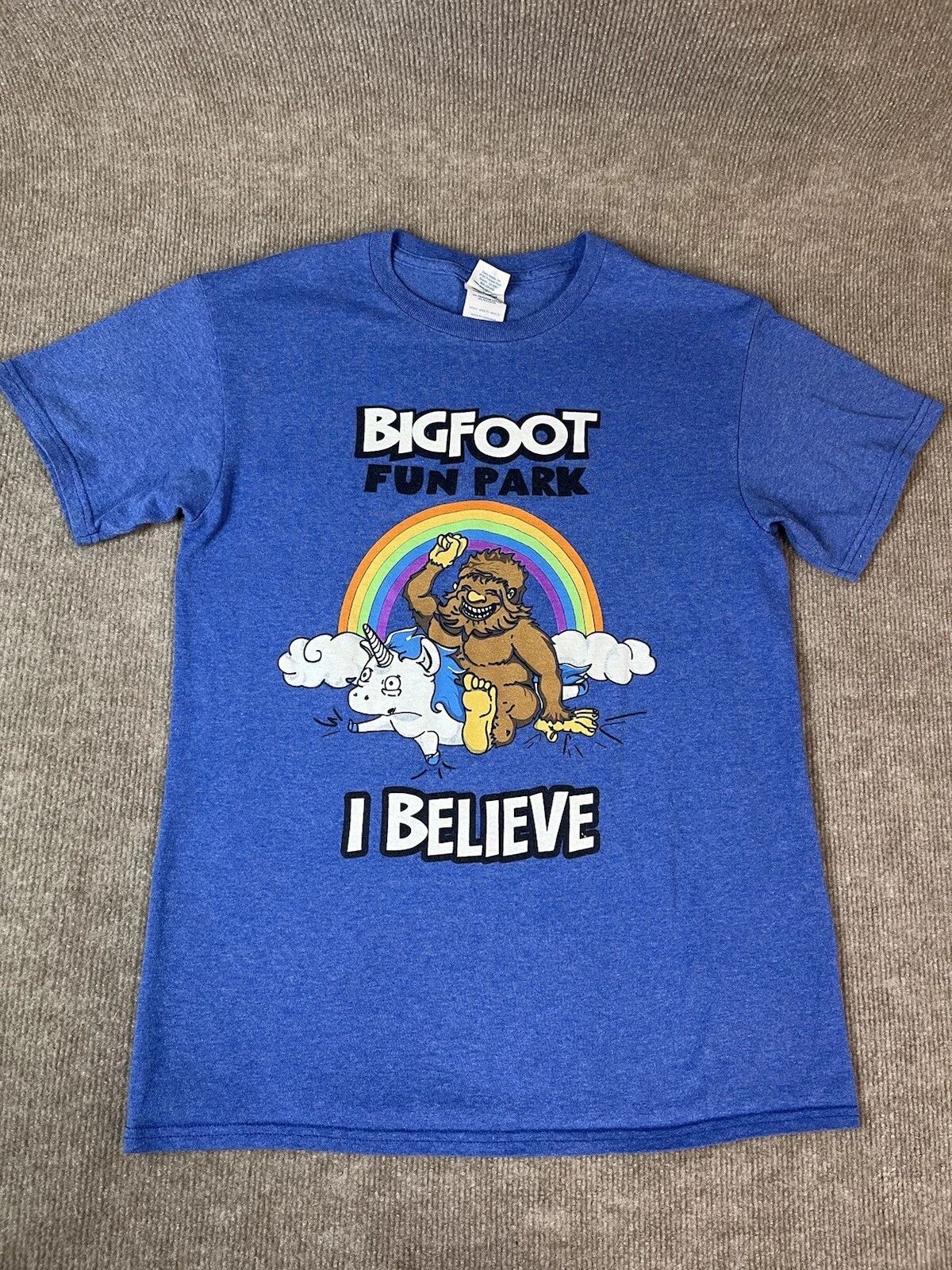 Adult S T Shirt Bigfoot Fun Park Rainbow Unicorn Believe Fantasy Blue Travel Unisex T-shirt, Sweatshirt, Hoodie, Long Sleeve Tee - T-Shirt, Sweatshirt, Hoodie
