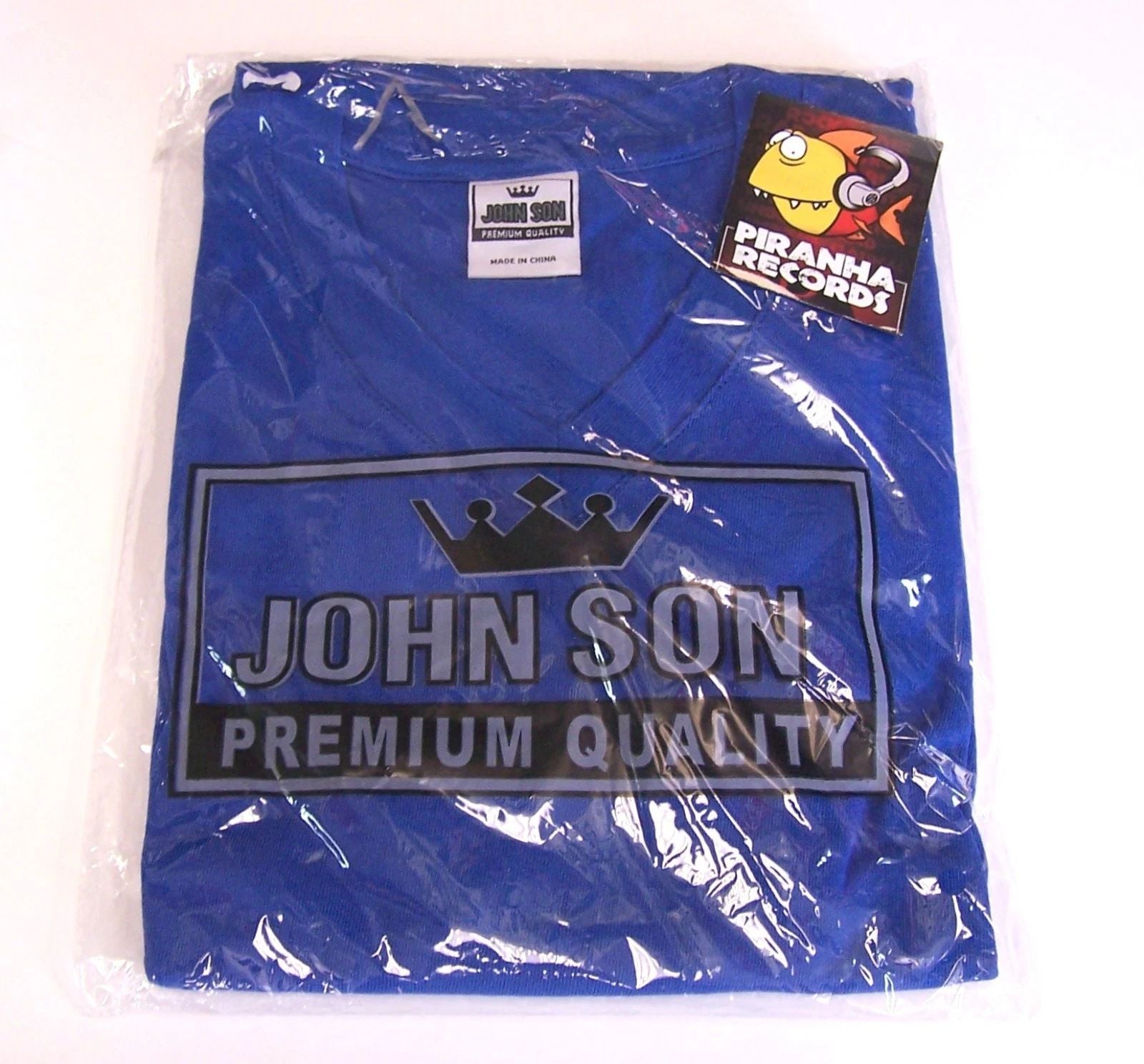 John Son Premium Quality Blue V-Neck Shirt M-5XL 100% Cotton Piranha Records Unisex T-shirt, Sweatshirt, Hoodie, Long Sleeve Tee - T-Shirt, Sweatshirt, Hoodie