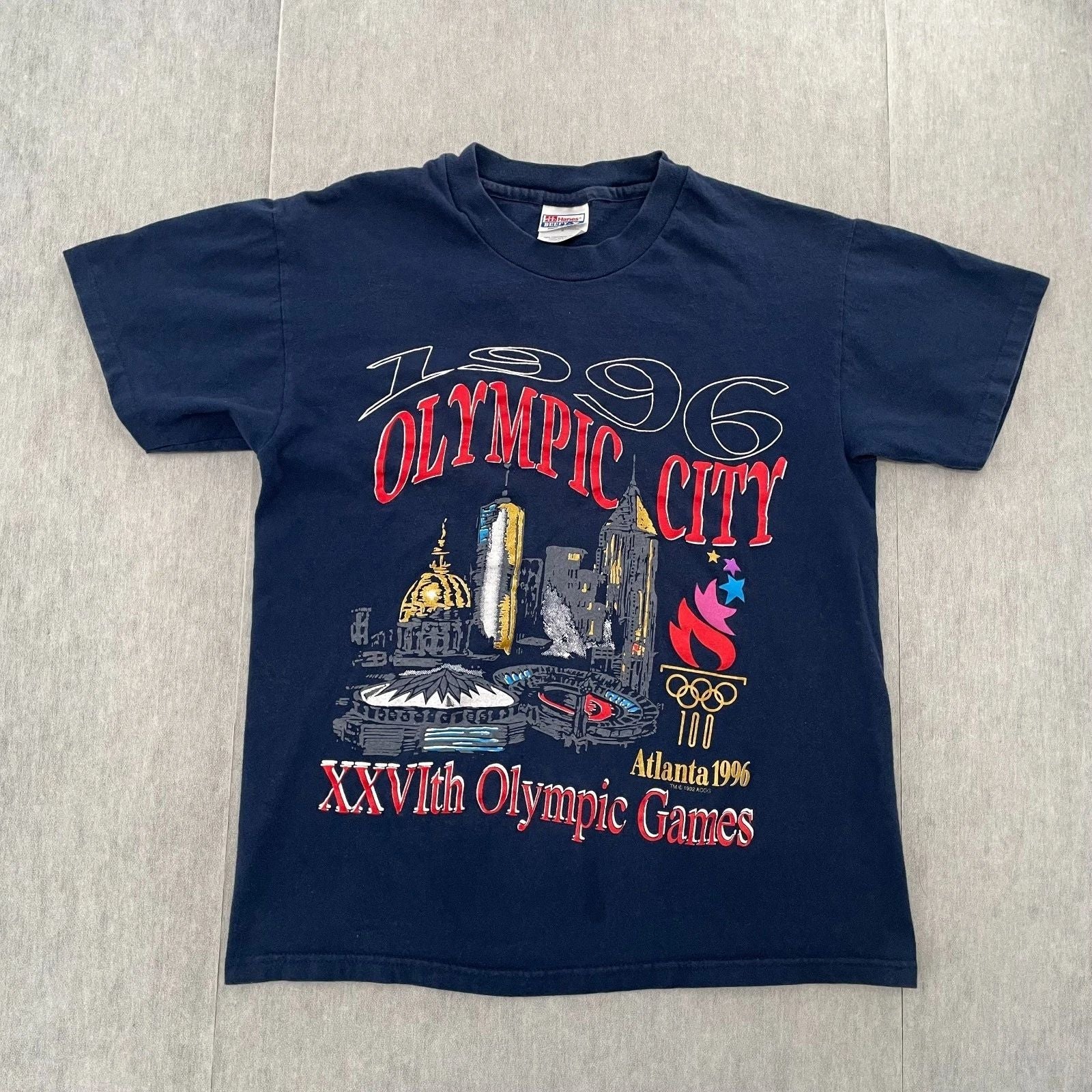 VINTAGE Atlanta Olympics Shirt Adult Medium Blue 1996 Olympic City Logo Mens 90s Unisex T-shirt, Sweatshirt, Hoodie, Long Sleeve Tee - T-Shirt, Sweatshirt, Hoodie